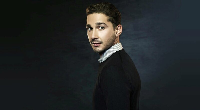 Man with Short Brown Hair — Black, Serious, Photograph, Sweater