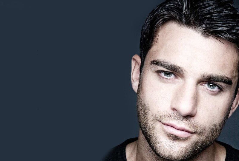 Man with Short Dark Hair — Black, Serious, Photograph, Beard, Blue Eyes