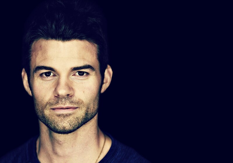 Man with Short Dark Hair — Black, Serious, Photograph, Necklace