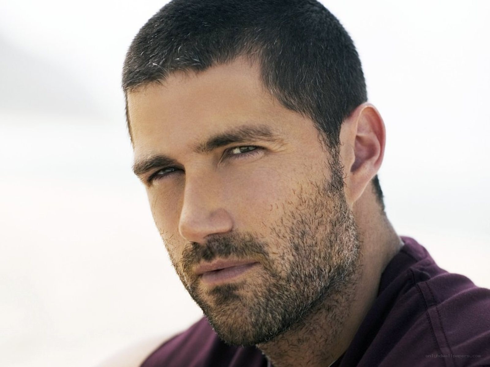 man with short hair and beard