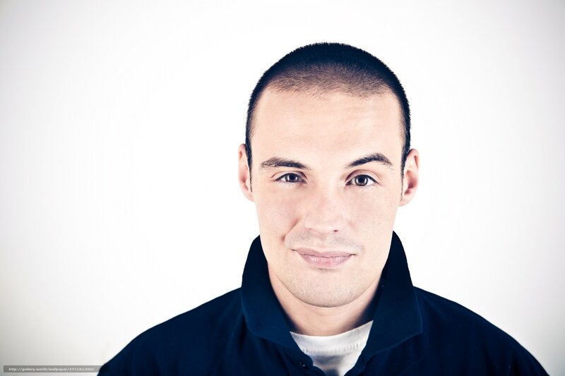 man with short hair smiling