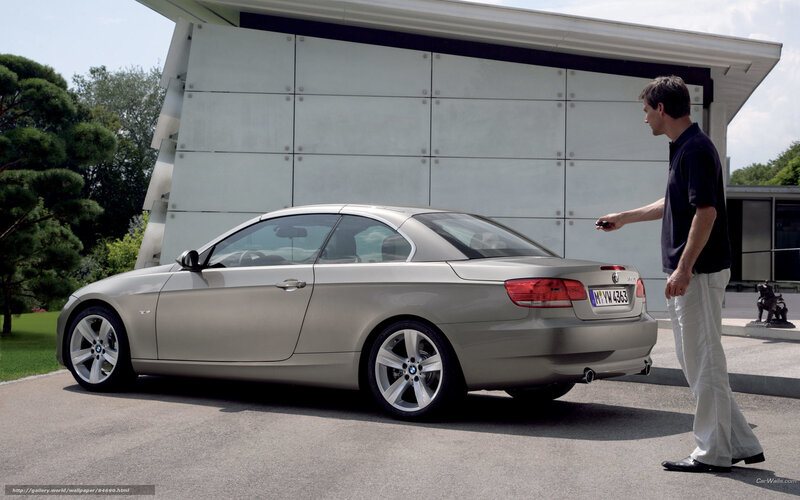 Man with silver BMW convertible
