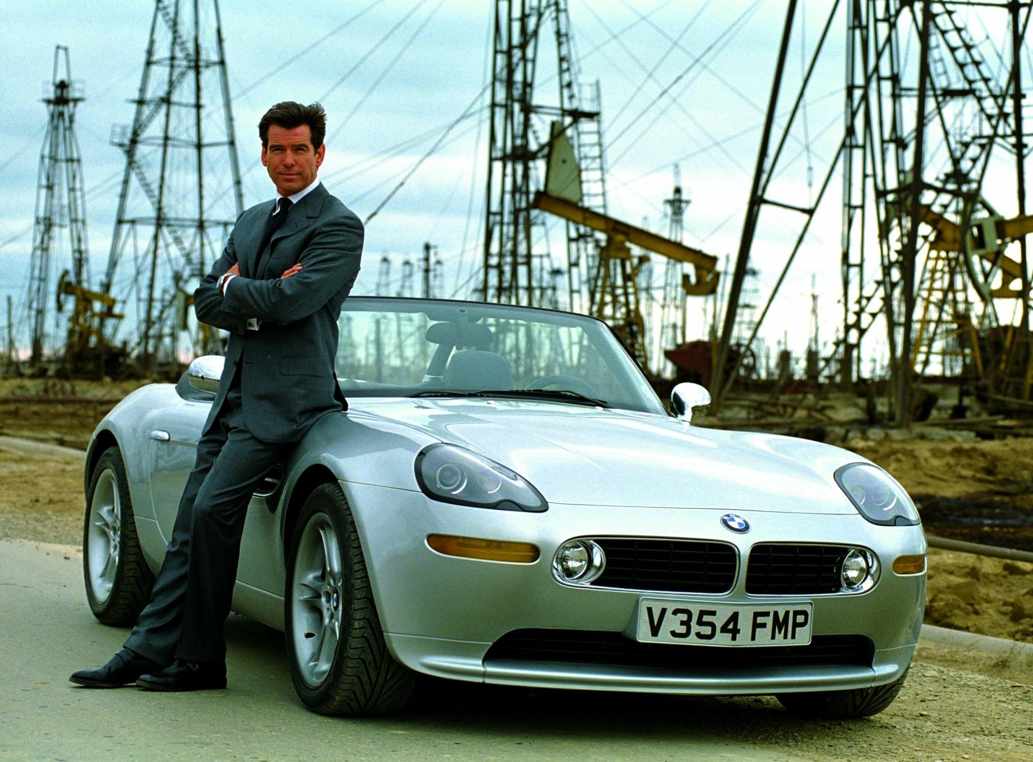Man with silver car