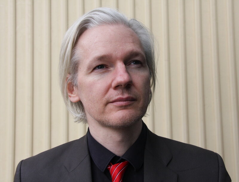 man with silver hair in suit