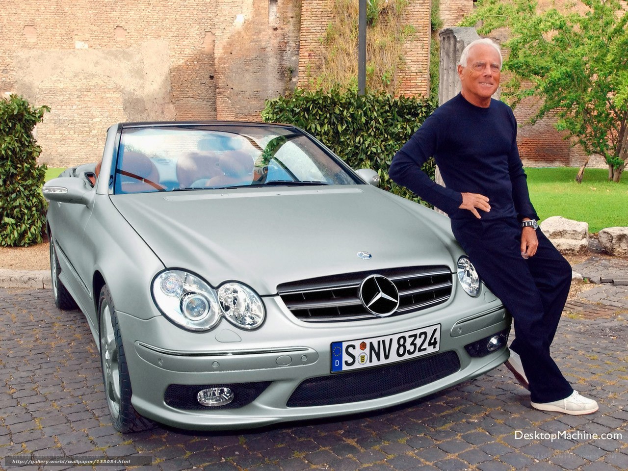 Man with silver Mercedes convertible