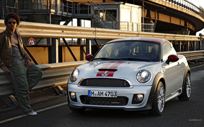 Man with silver MINI Cooper