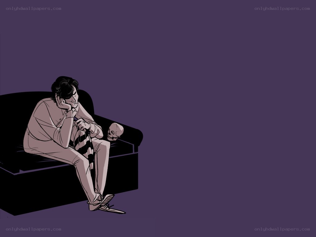 man with skull on couch