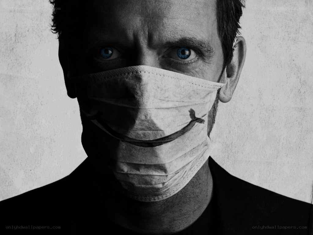 man with smiley face mask