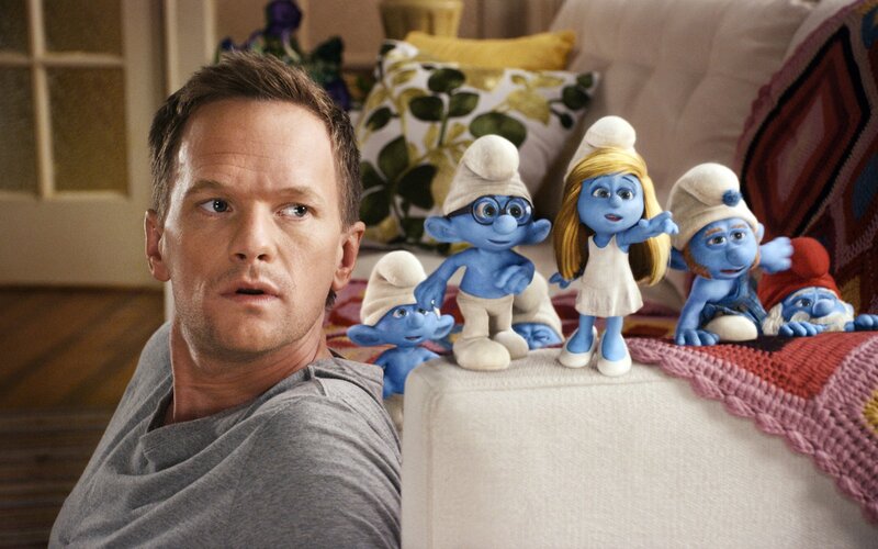 man with smurfs on couch
