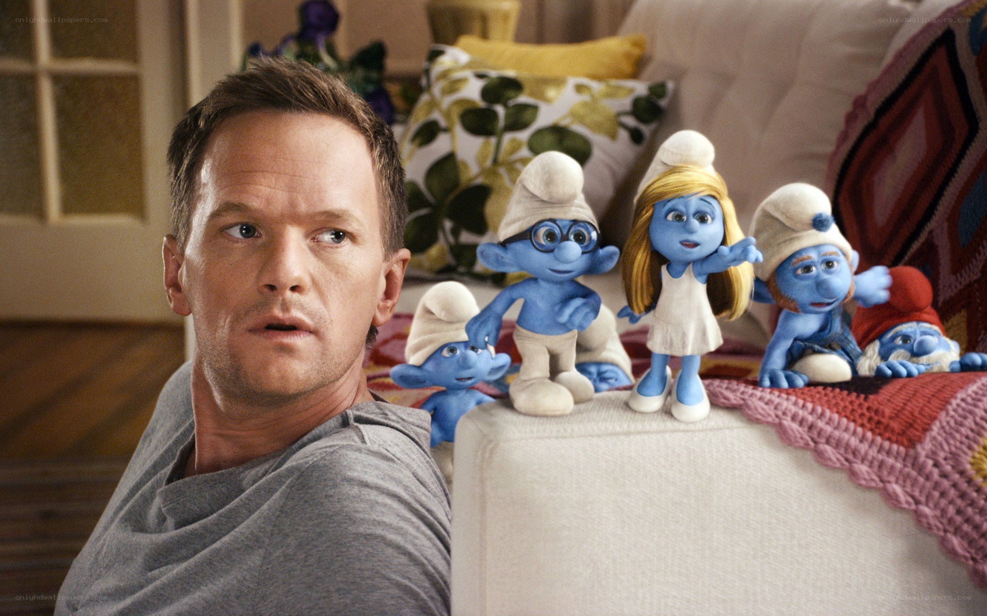 man with smurfs on couch