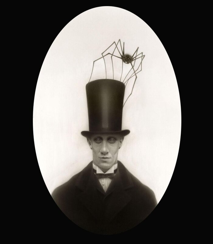 man with spider hat