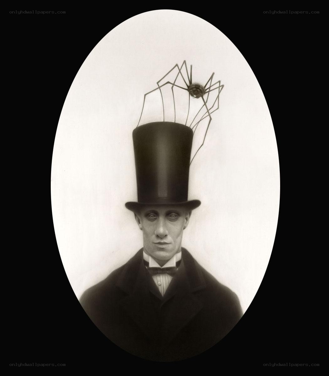 man with spider hat