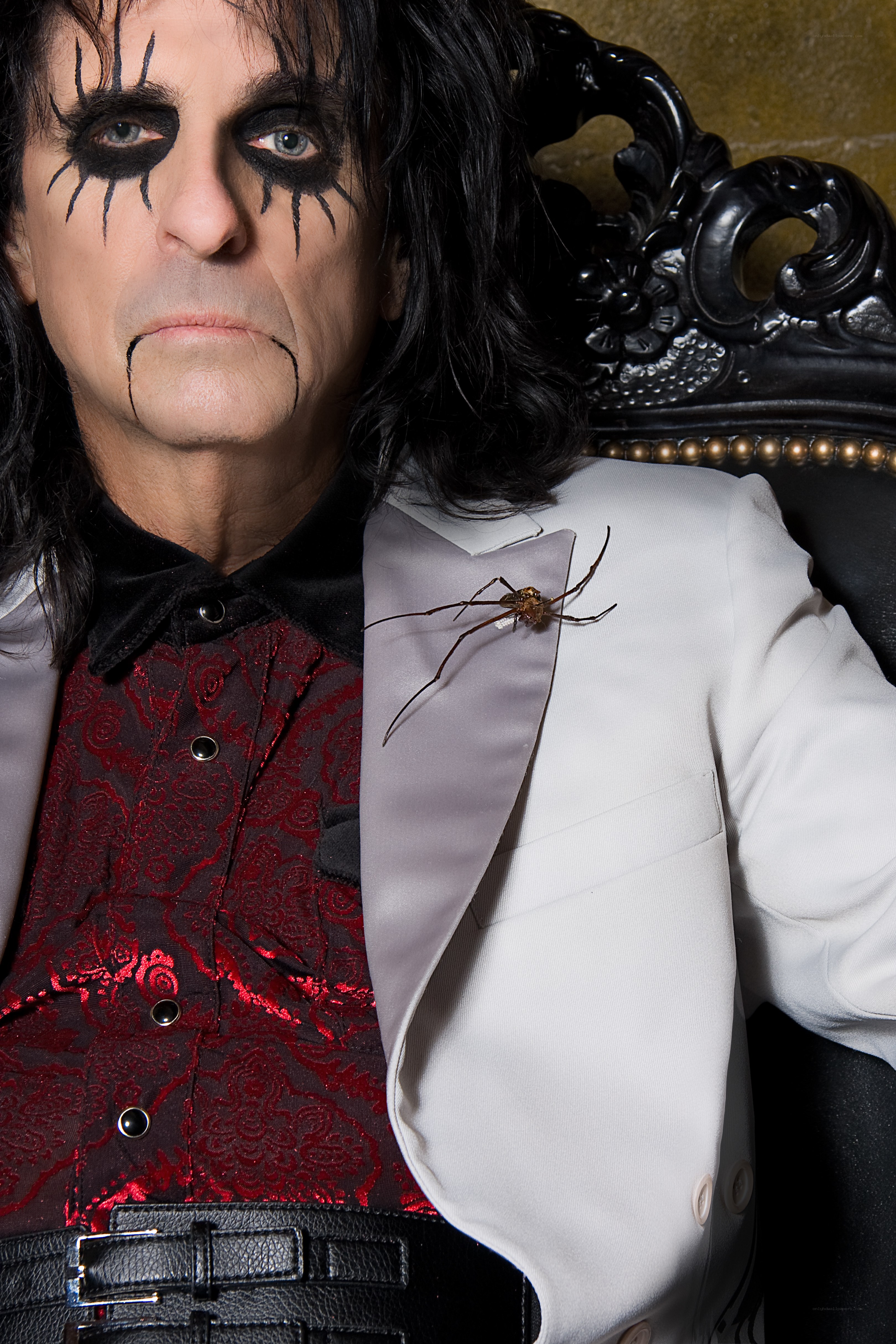 Man with spider on suit