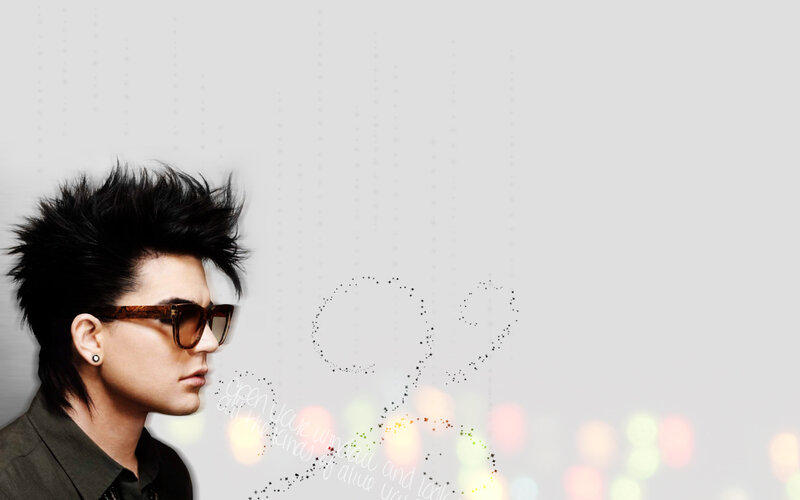 man with spiky hair and sunglasses