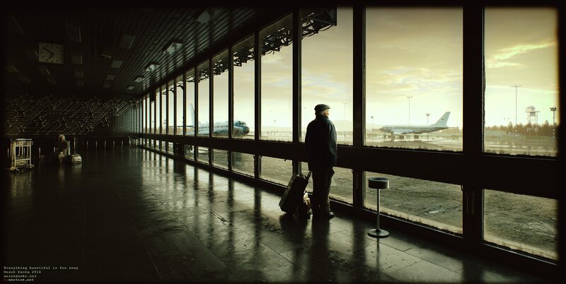 Man with Suitcase at Airport — Black