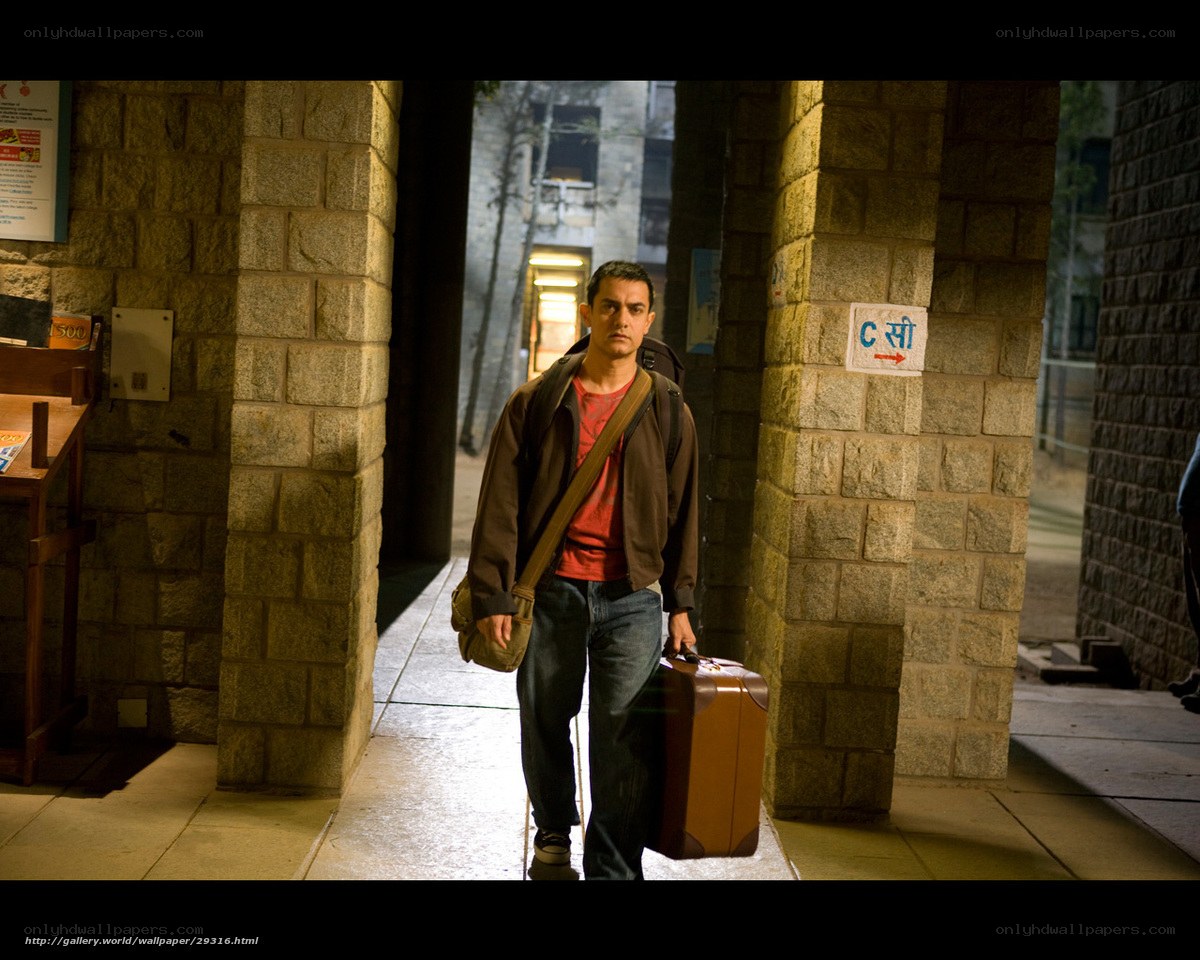 man with suitcase walking
