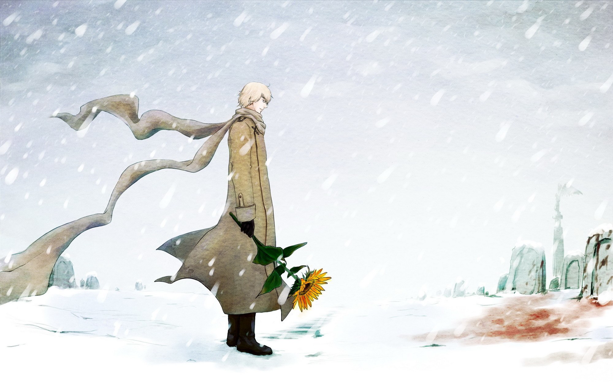 Man with sunflower in snow