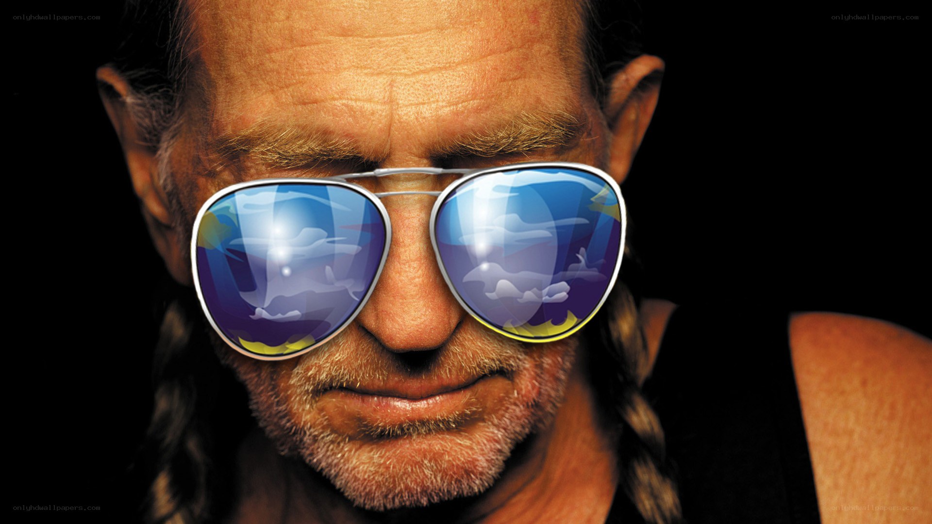 man with sunglasses and braids