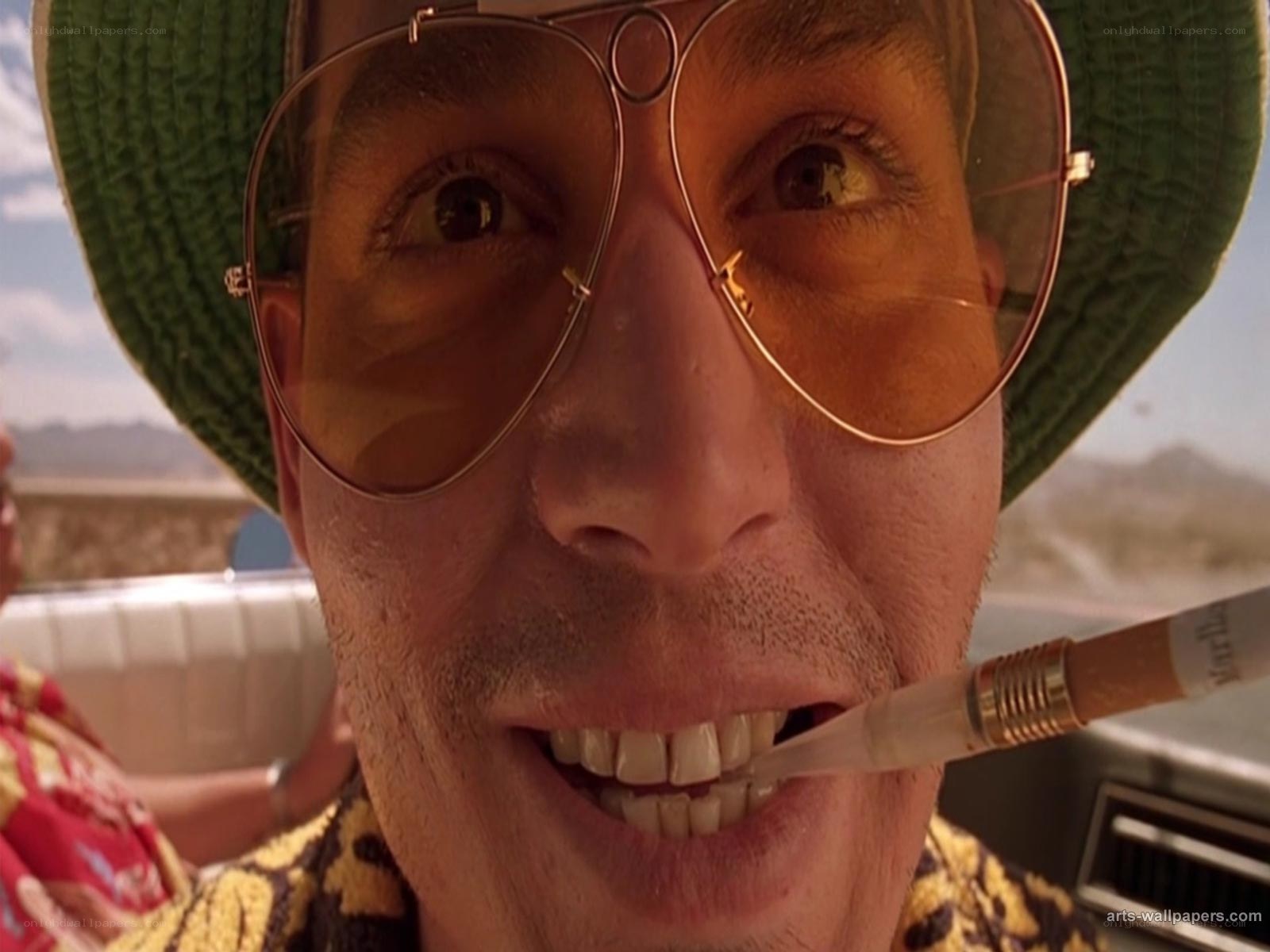 man with sunglasses and cigarette