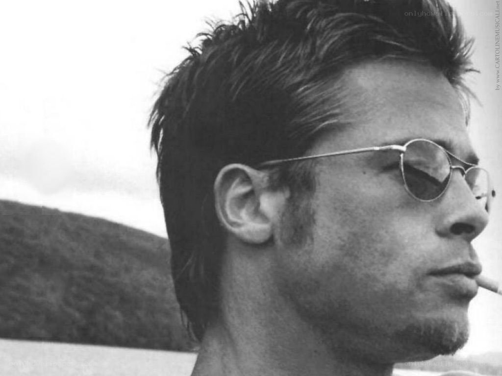 man with sunglasses and cigarette