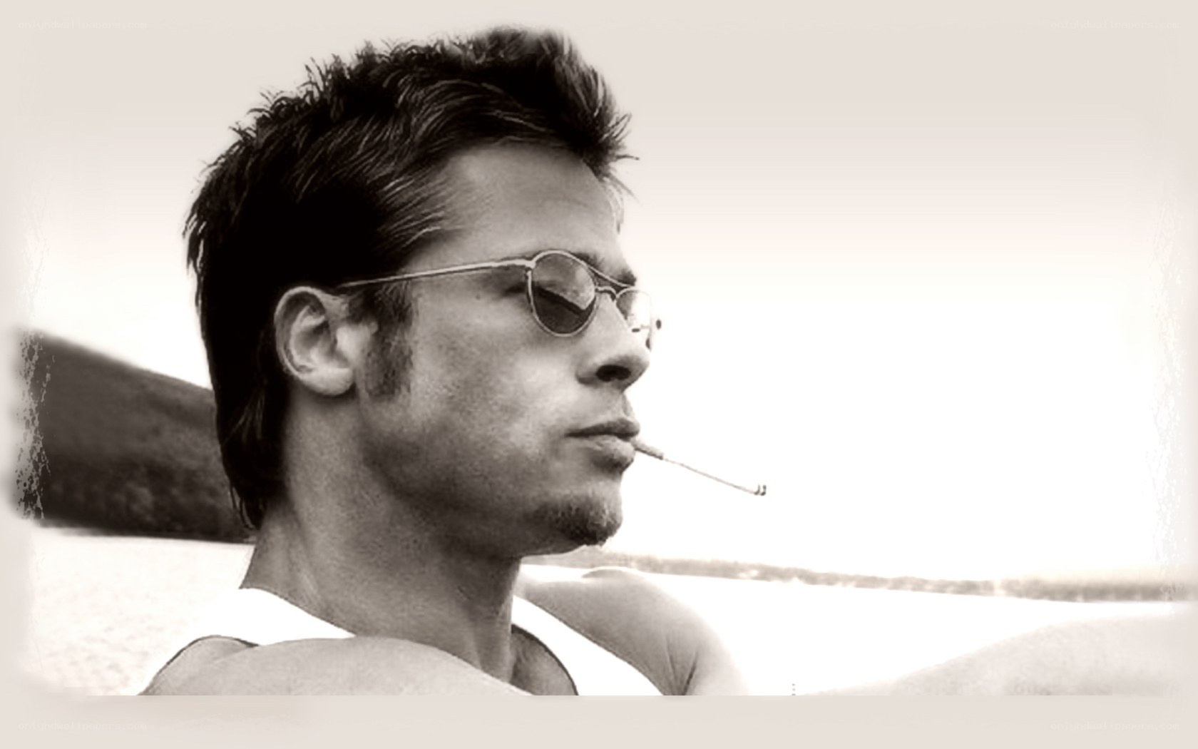man with sunglasses and cigarette