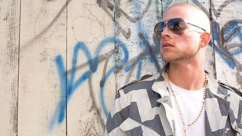 man with sunglasses and graffiti