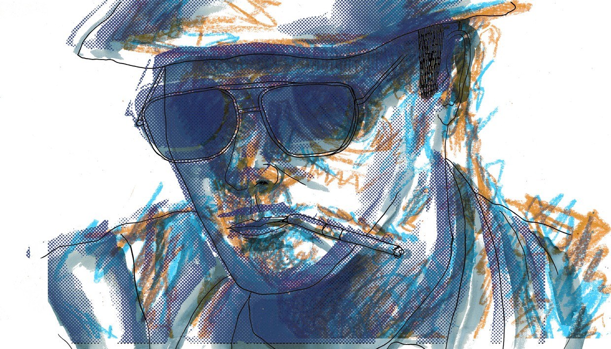 man with sunglasses and hat