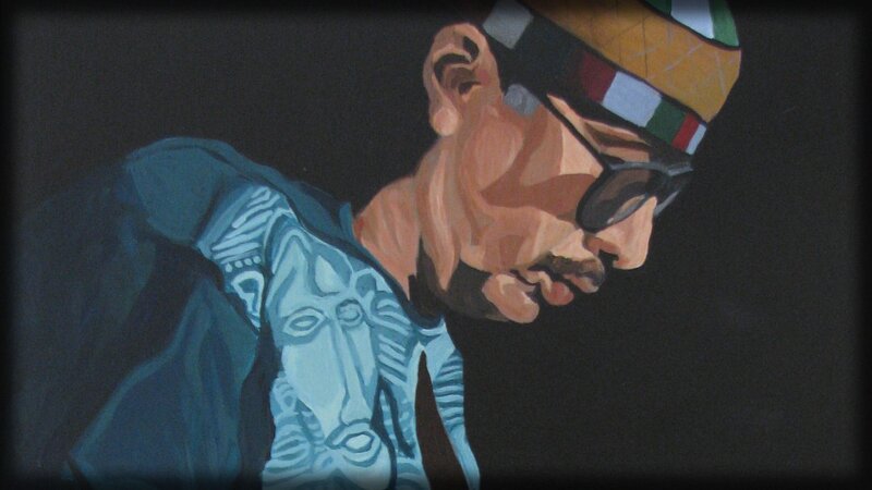 man with sunglasses and hat