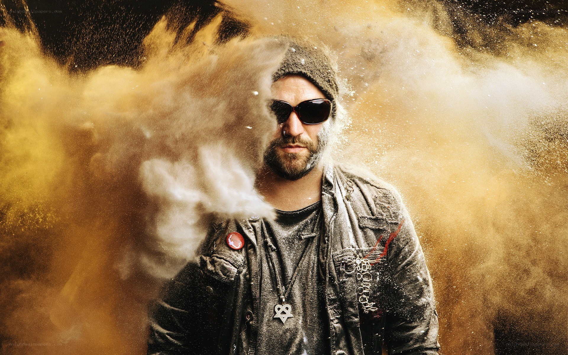 man with sunglasses and powder explosion