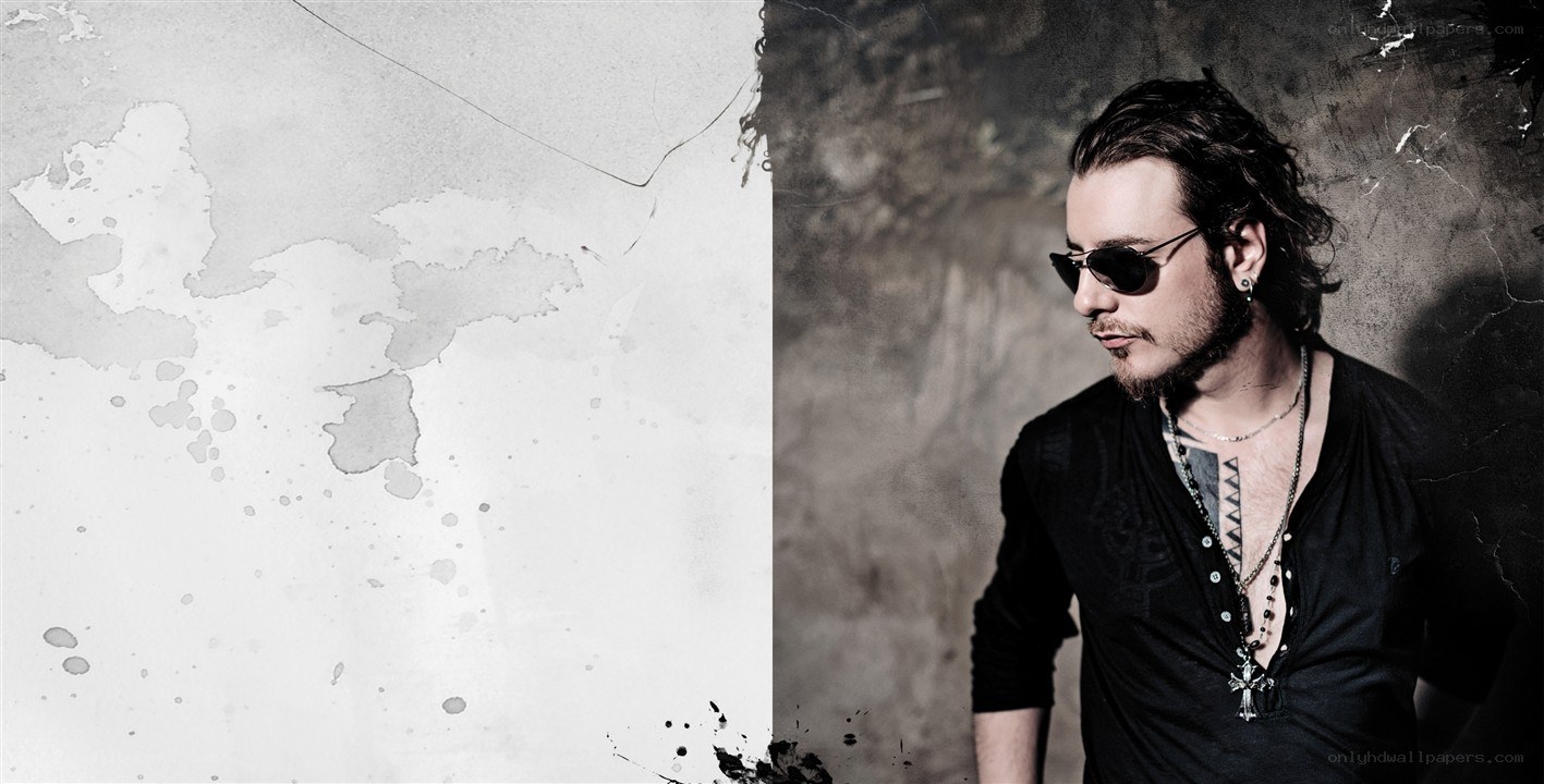man with sunglasses and tattoos