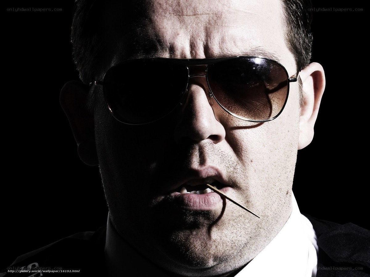 man with sunglasses and toothpick