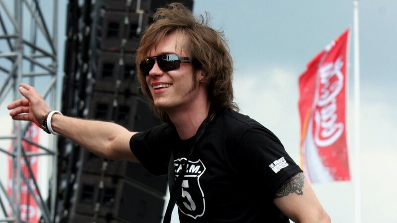 Man with Sunglasses on Stage