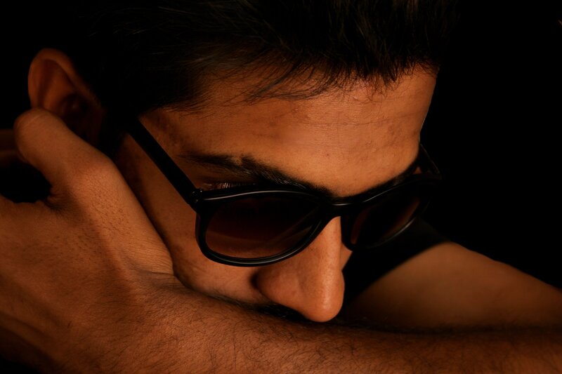 man with sunglasses resting