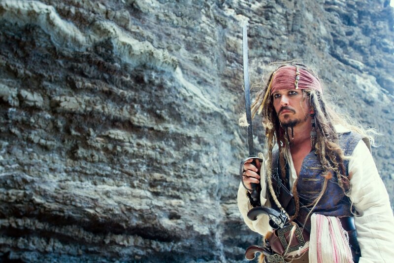 Man with Sword and Dreadlocks