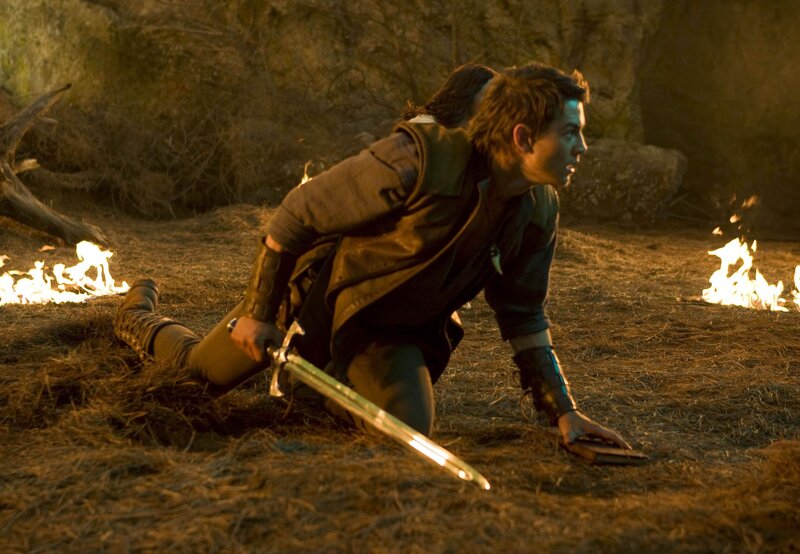 Man with sword in cave