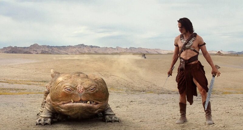 man with sword in desert