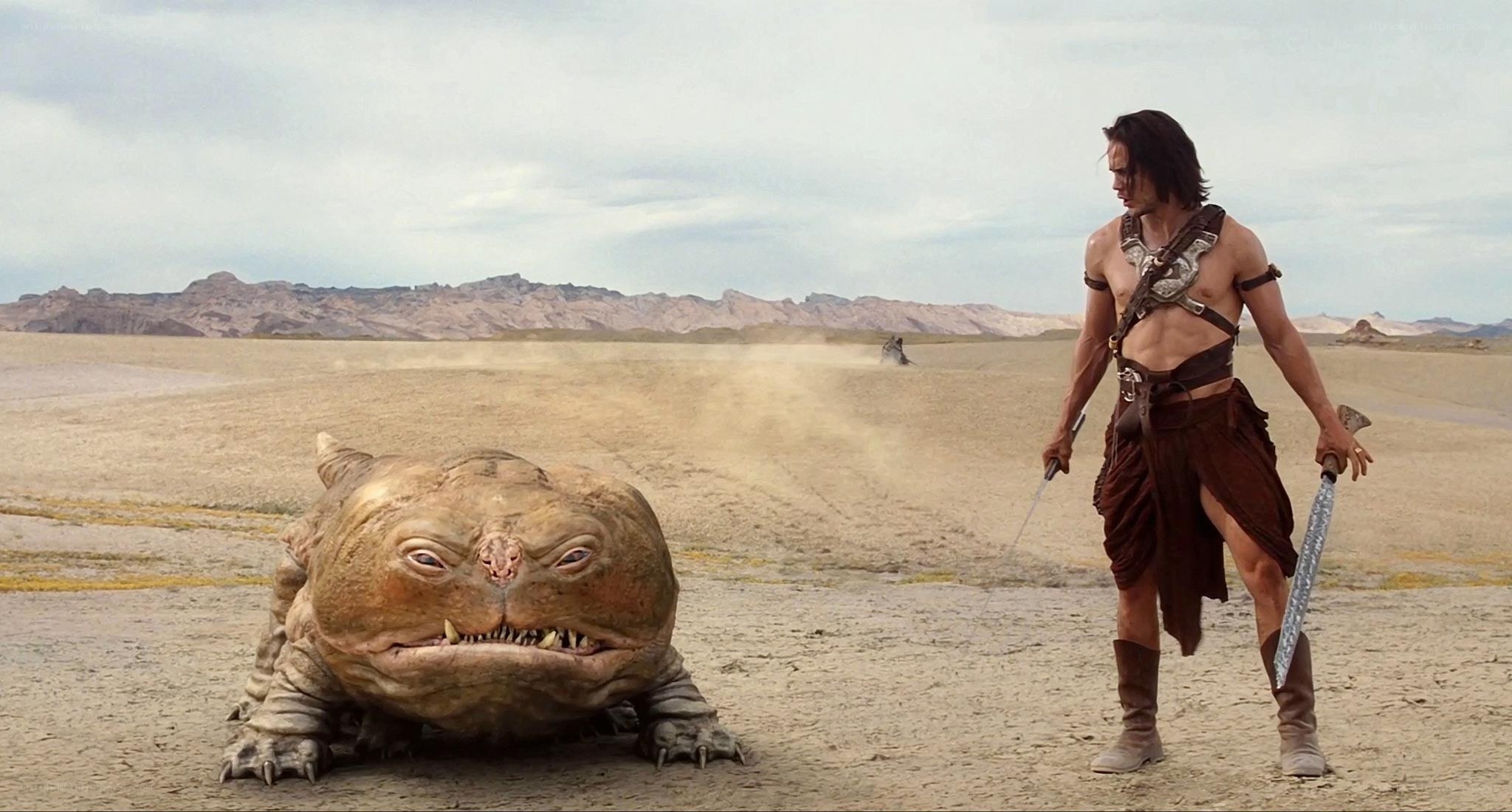 man with sword in desert