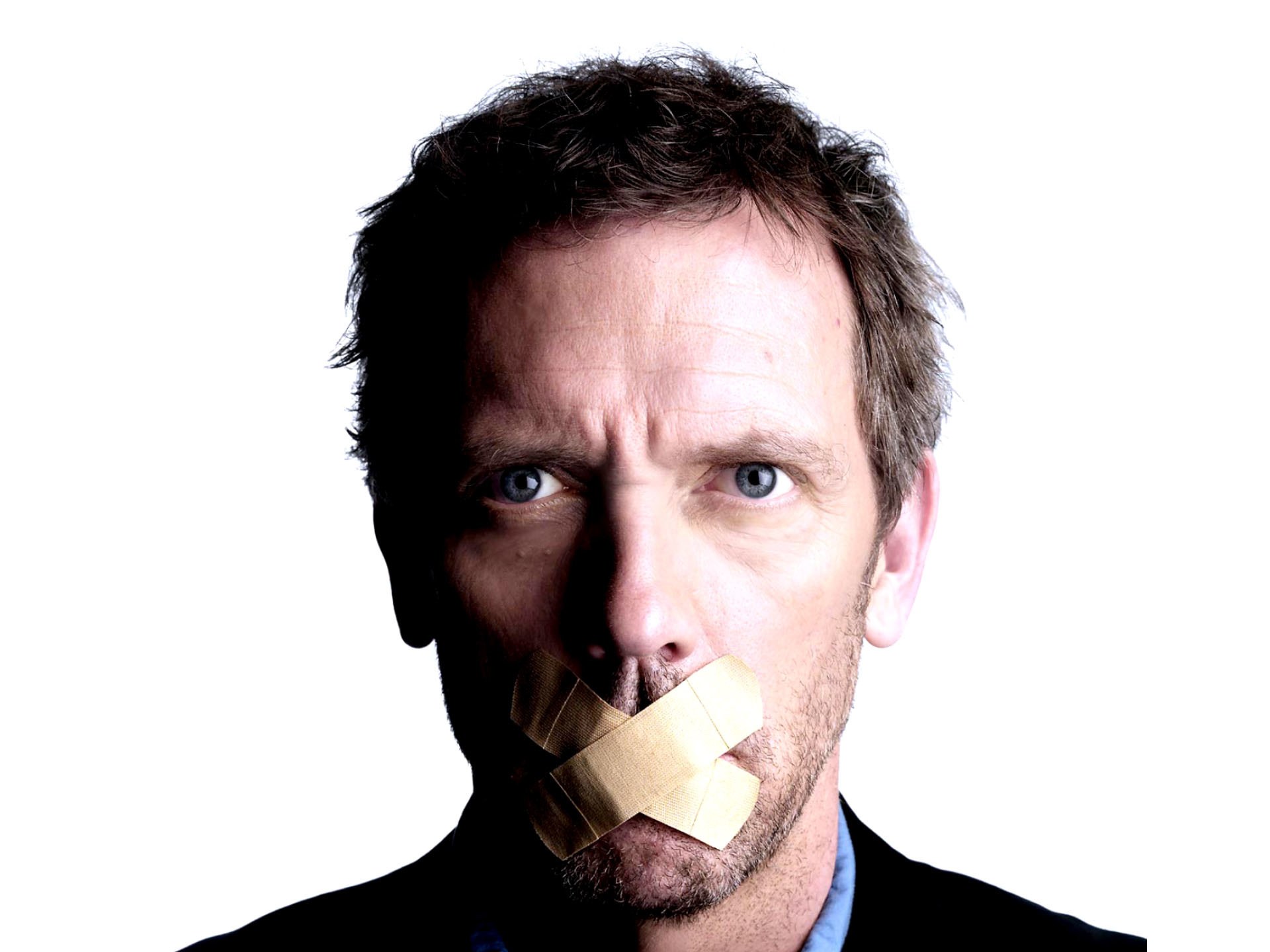 Man with tape over mouth
