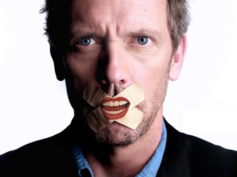 Man with tape over mouth
