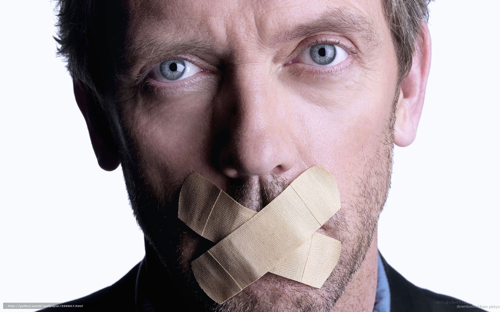 man with tape over mouth