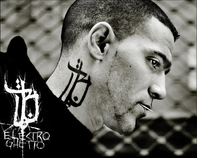 man with tattoo and toothpick
