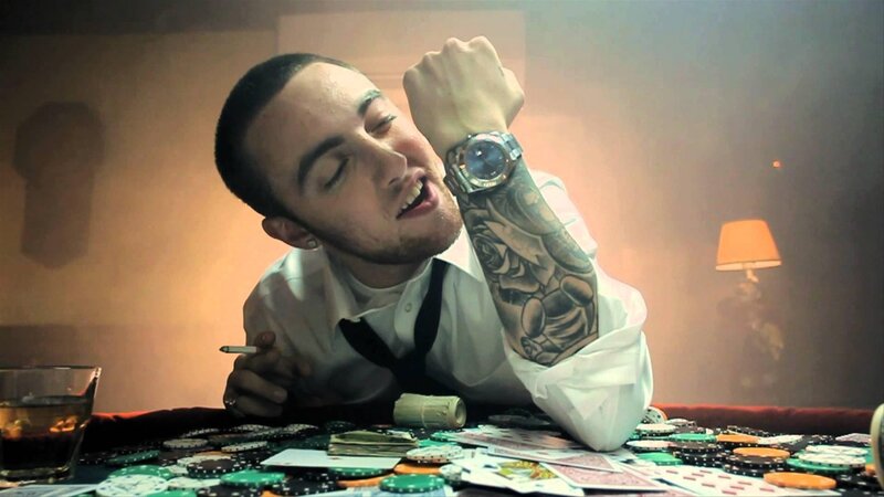Man with Tattoo at Poker Table