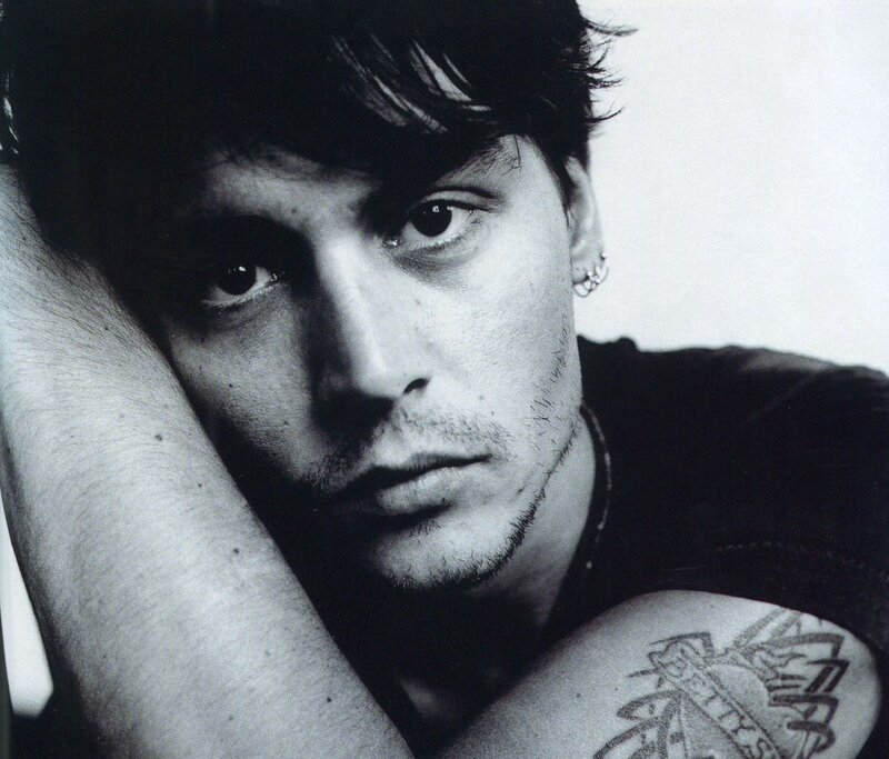 Man with Tattoo — Black, Serious