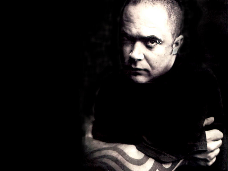 Man with Tattooed Arm — Black, Dramatic, Photograph, Tattoo, Black Shirt