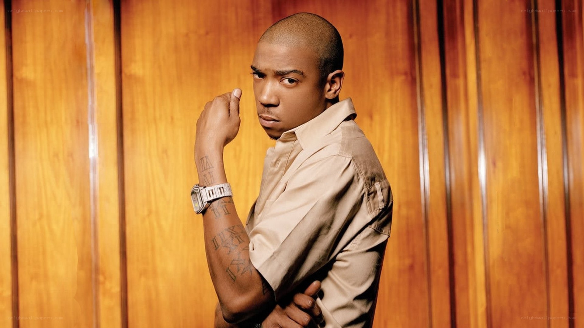 man with tattooed arm