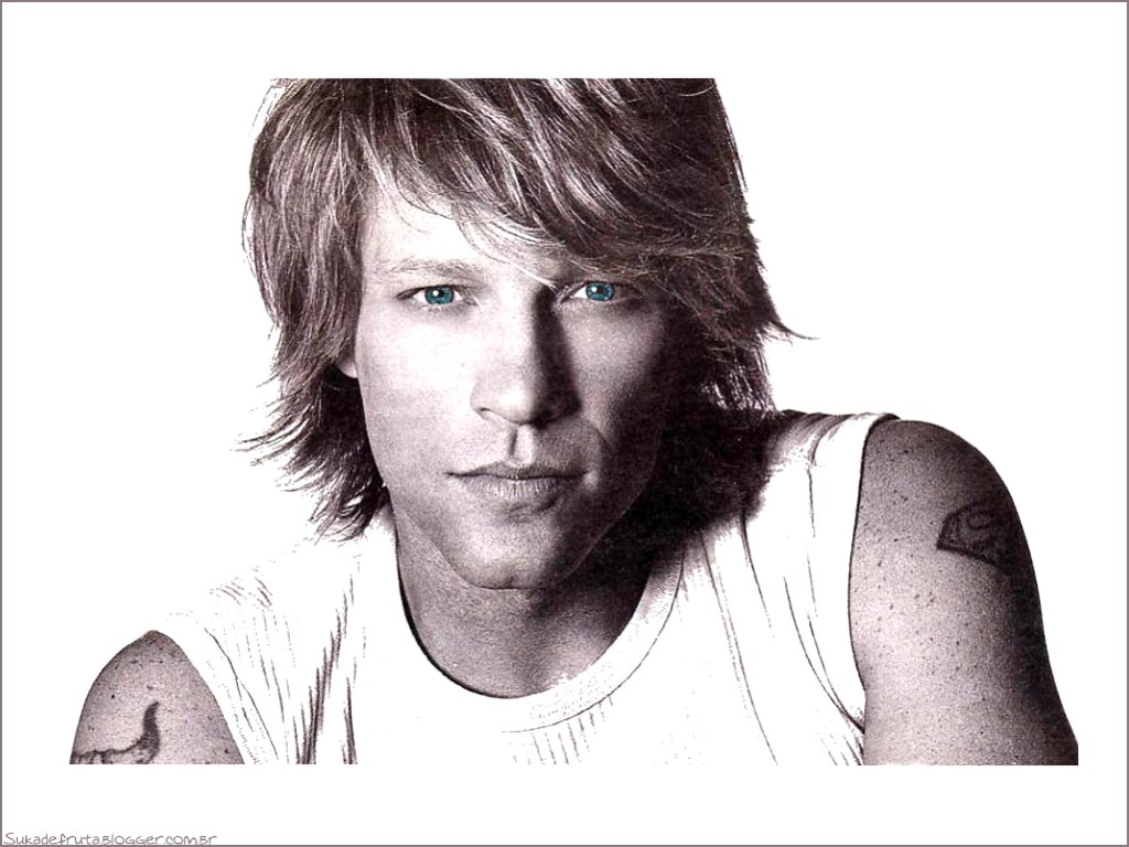 man with tattoos and blue eyes