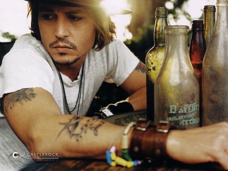 Man with Tattoos and Bottles