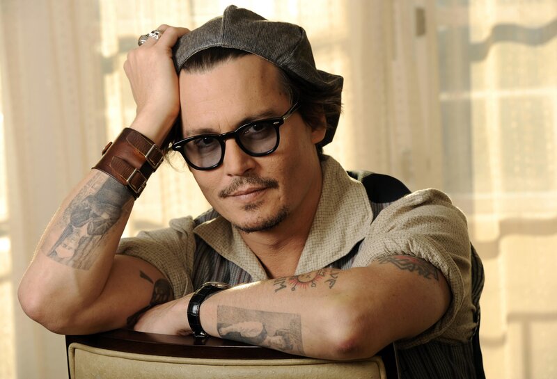 Man with Tattoos and Glasses — Brown, Contemplative, Afternoon, Photograph, Hat