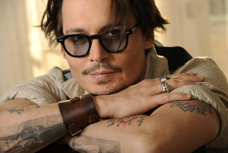 Man with Tattoos and Glasses — Brown, Contemplative, Photograph, Ring