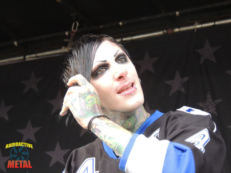 Man with Tattoos and Makeup — Black, Intense